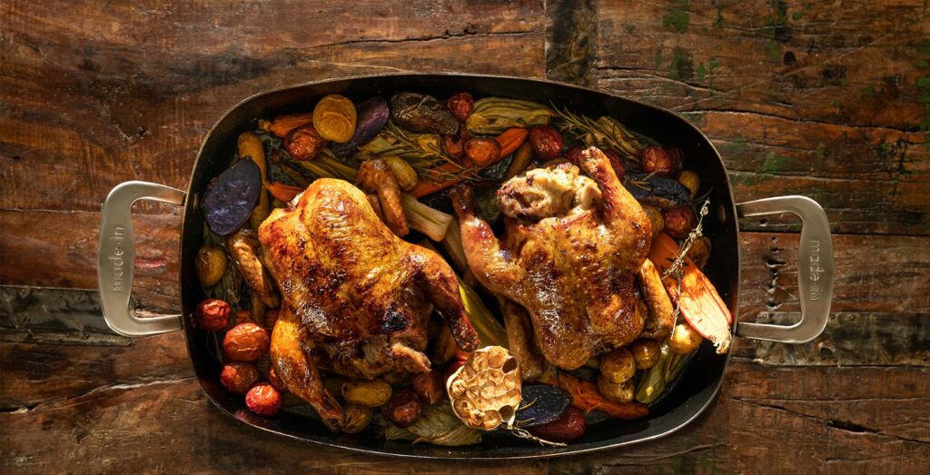 best Roasting pan with two roasted chickens and vegetables  